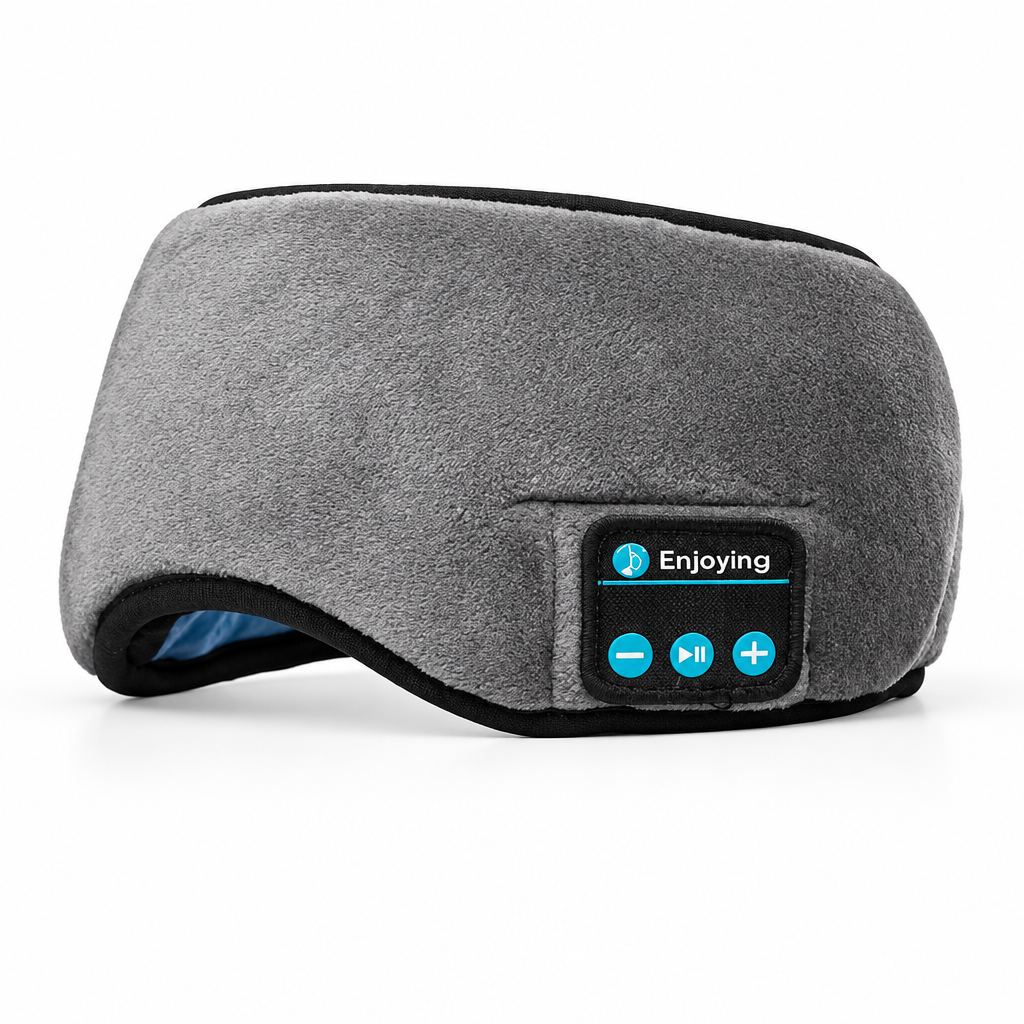 Máscara gris para dormir con música y conexión Bluetooth sobre fondo blanco